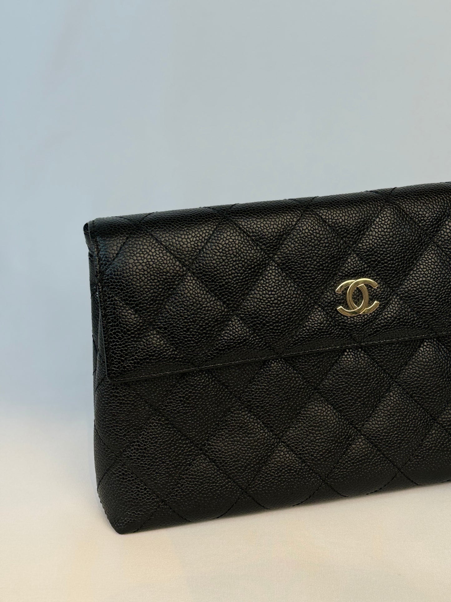 Chanel Quilted CC-flap clutch