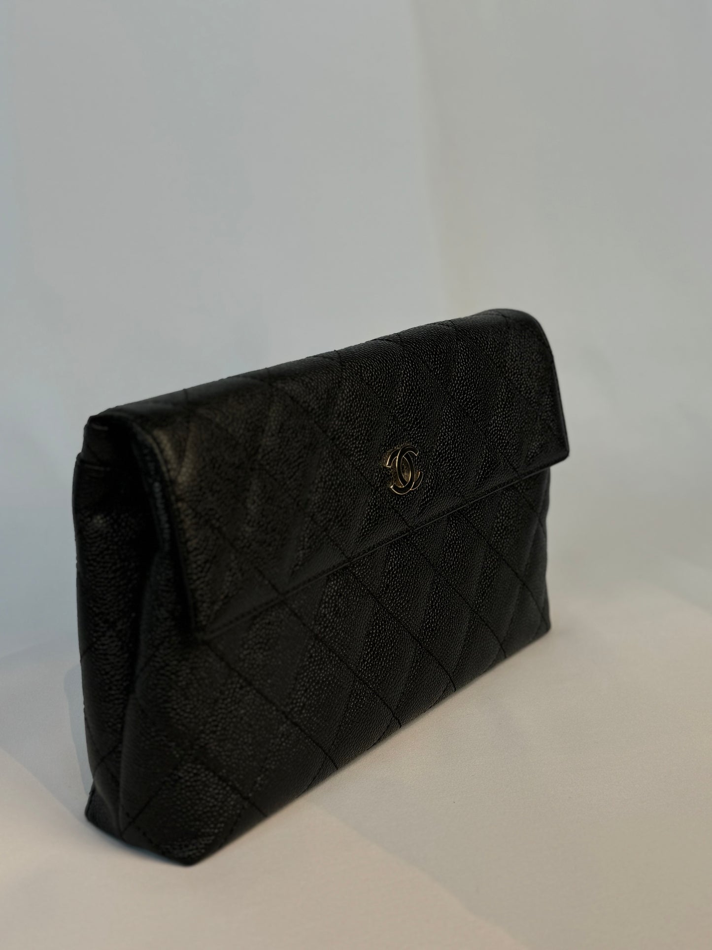 Chanel Quilted CC-flap clutch