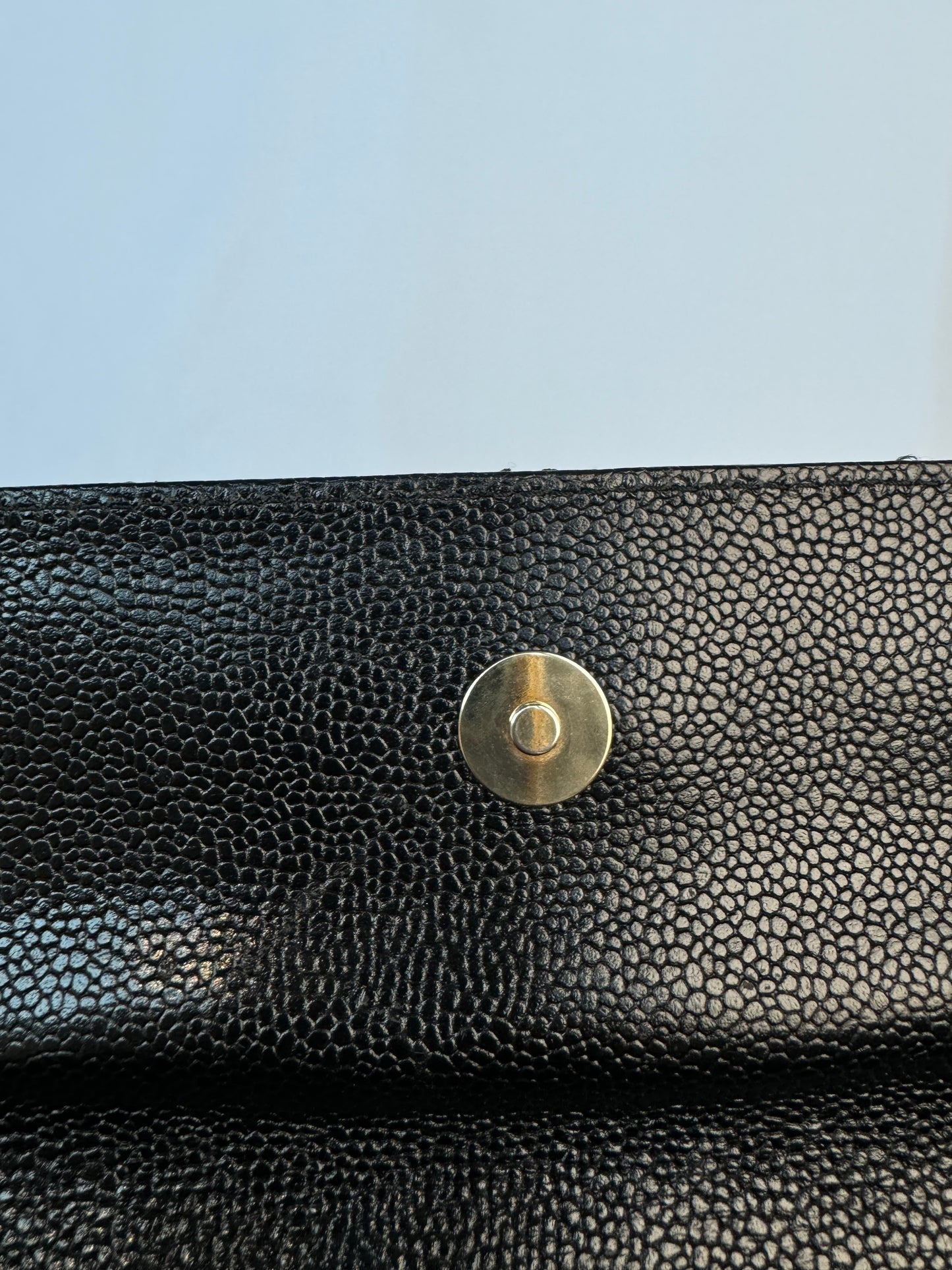 Chanel Quilted CC-flap clutch