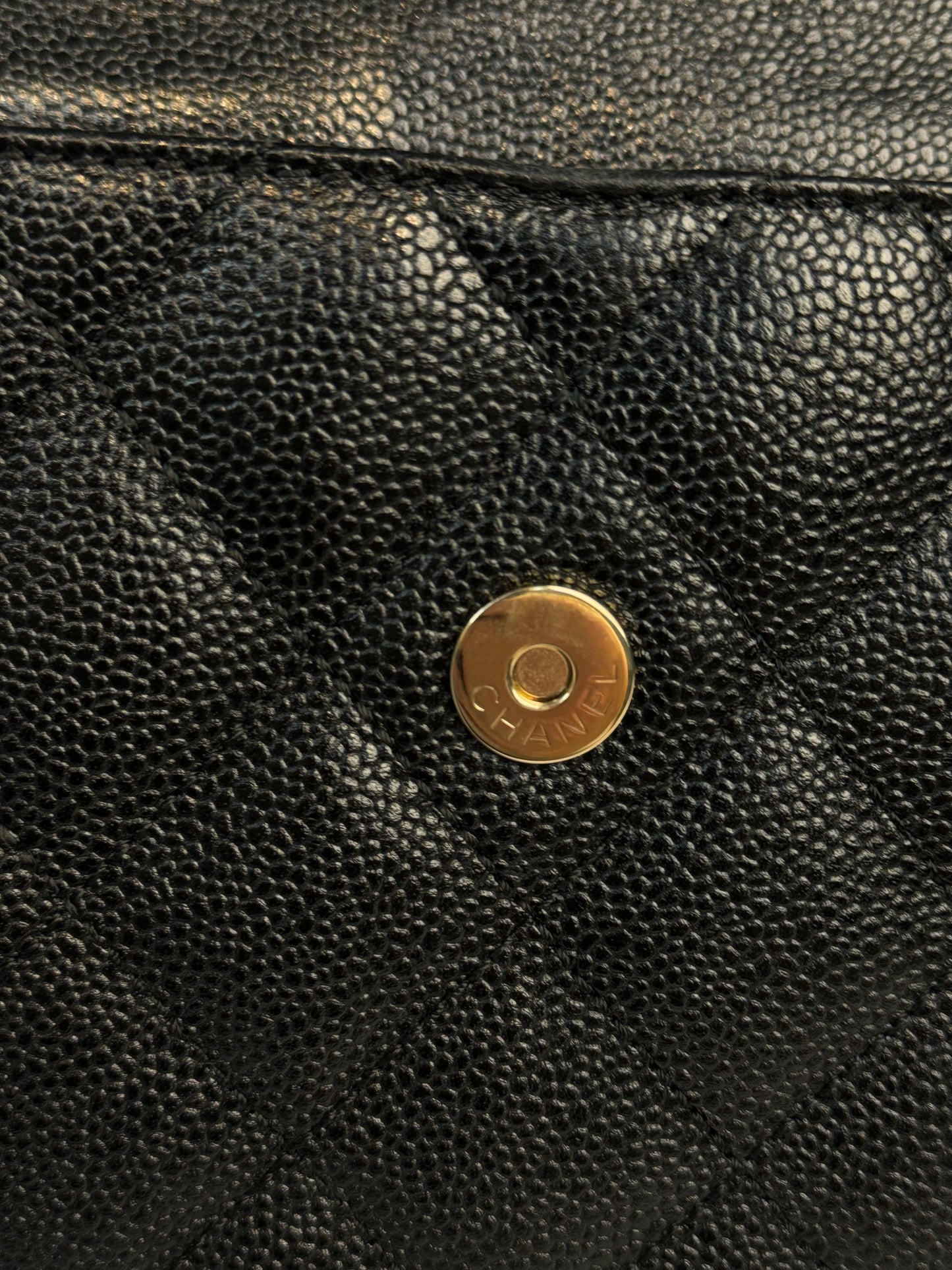 Chanel Quilted CC-flap clutch