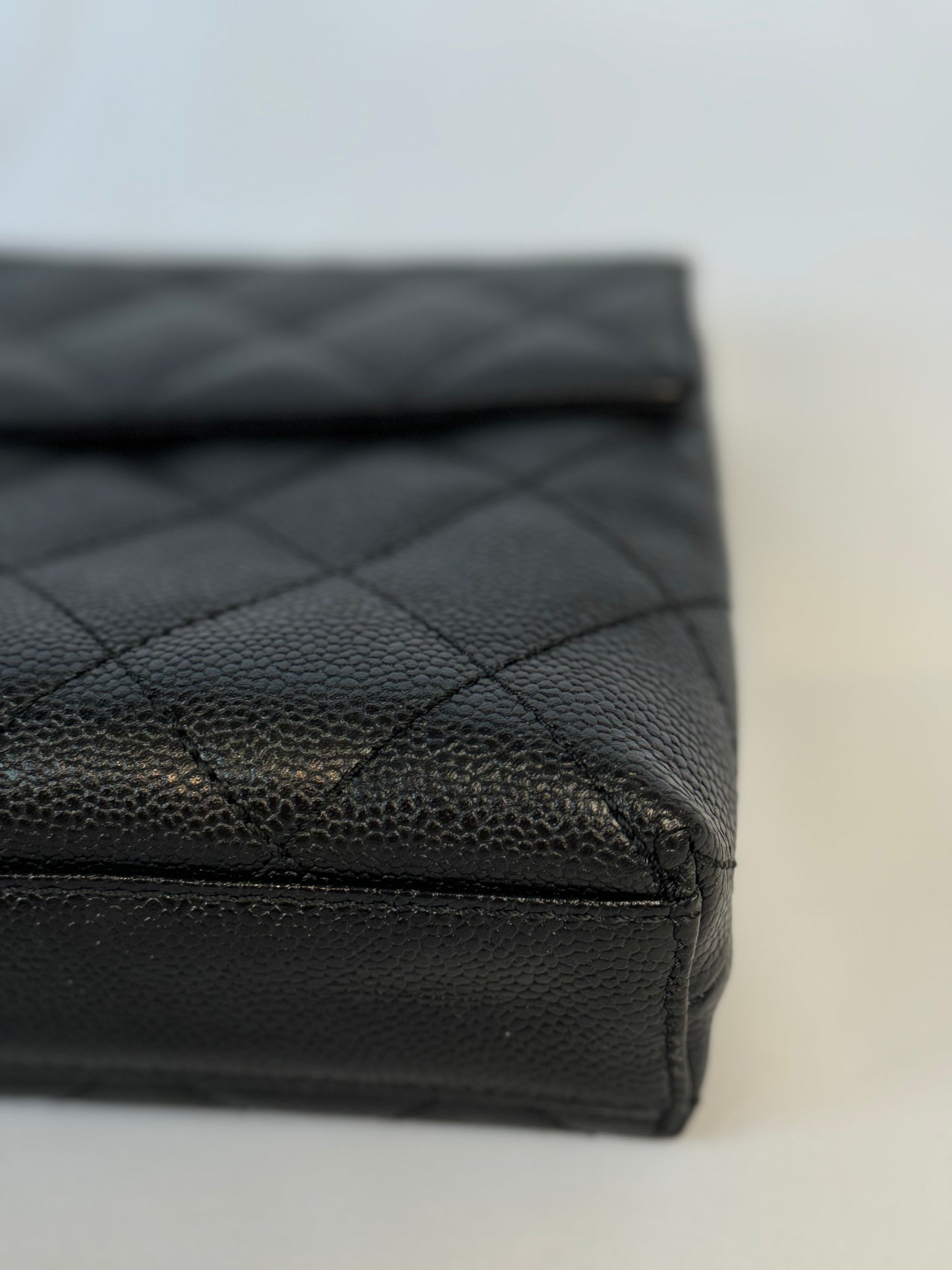 Chanel Quilted CC-flap clutch