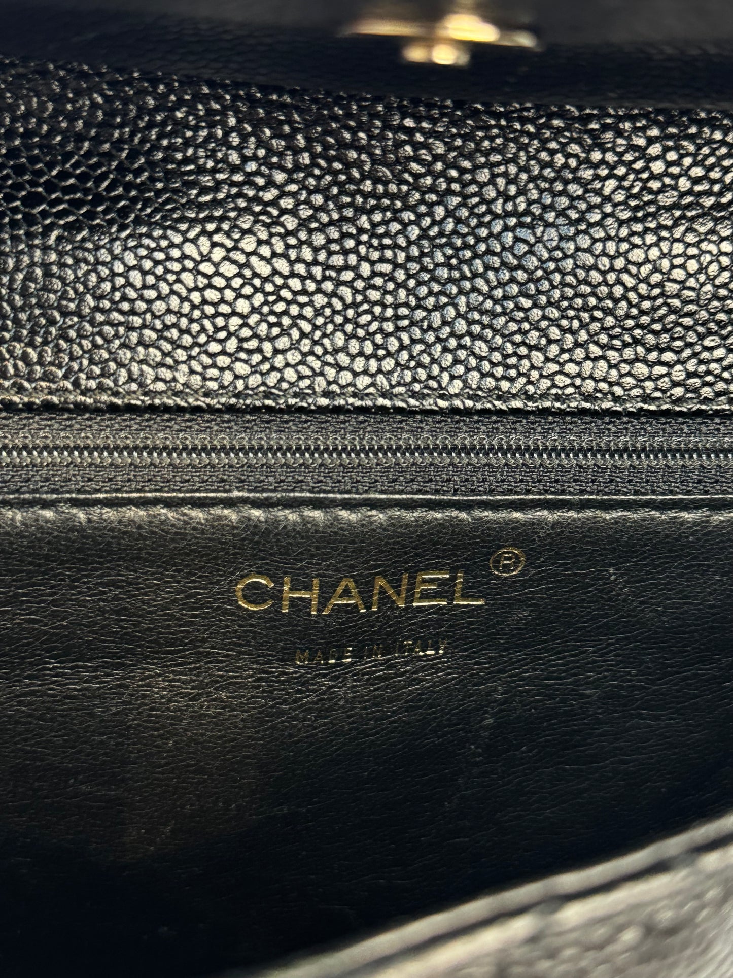 Chanel Quilted CC-flap clutch