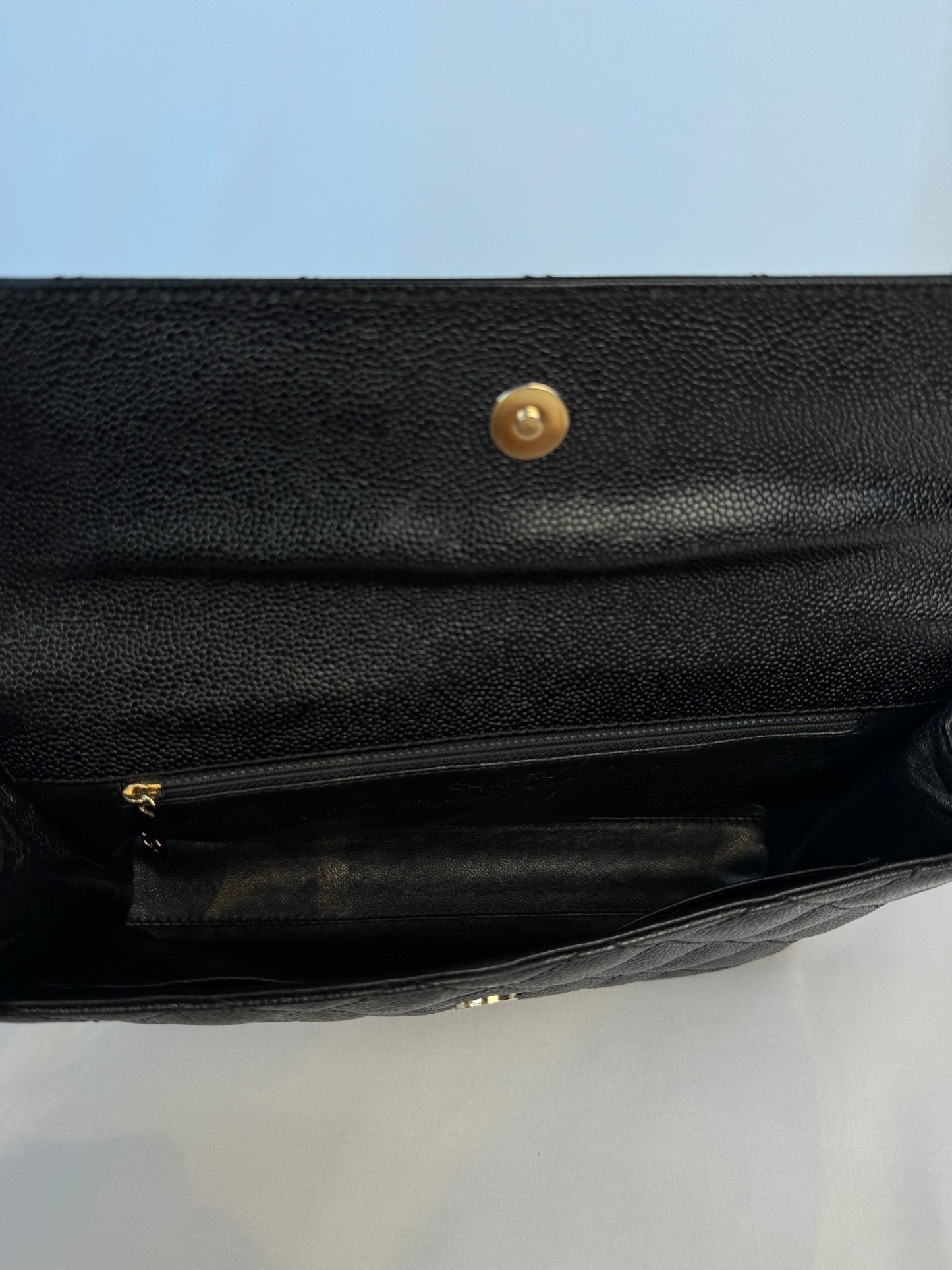 Chanel Quilted CC-flap clutch