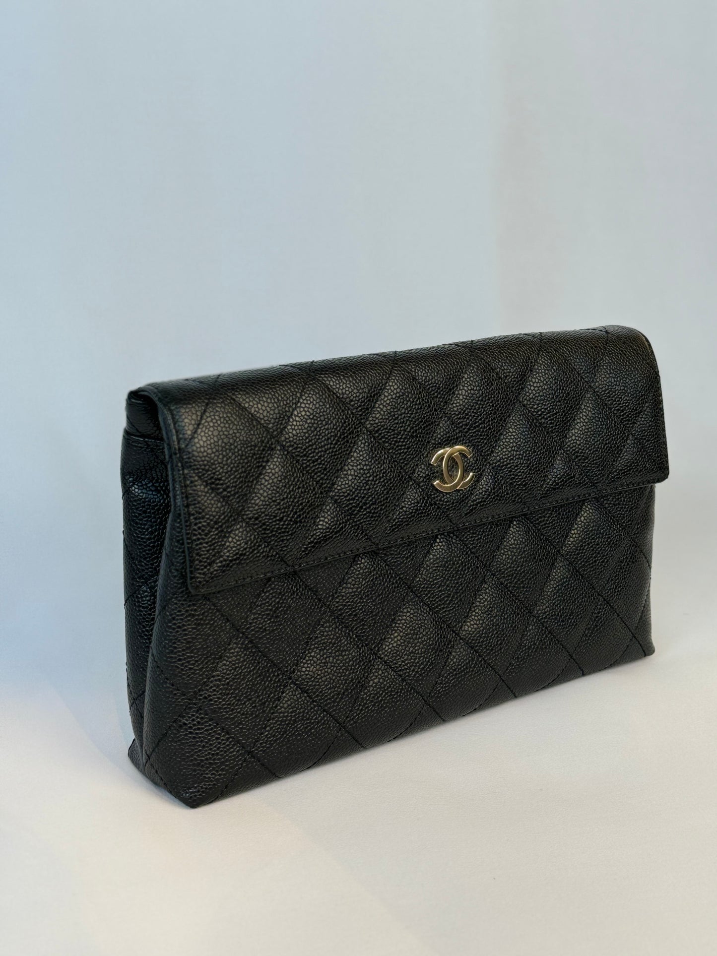 Chanel Quilted CC-flap clutch