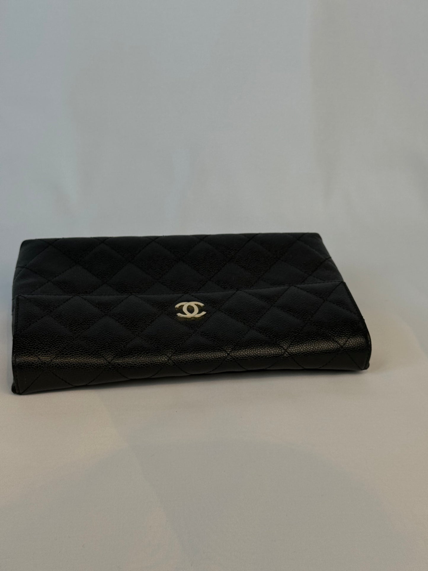 Chanel Quilted CC-flap clutch