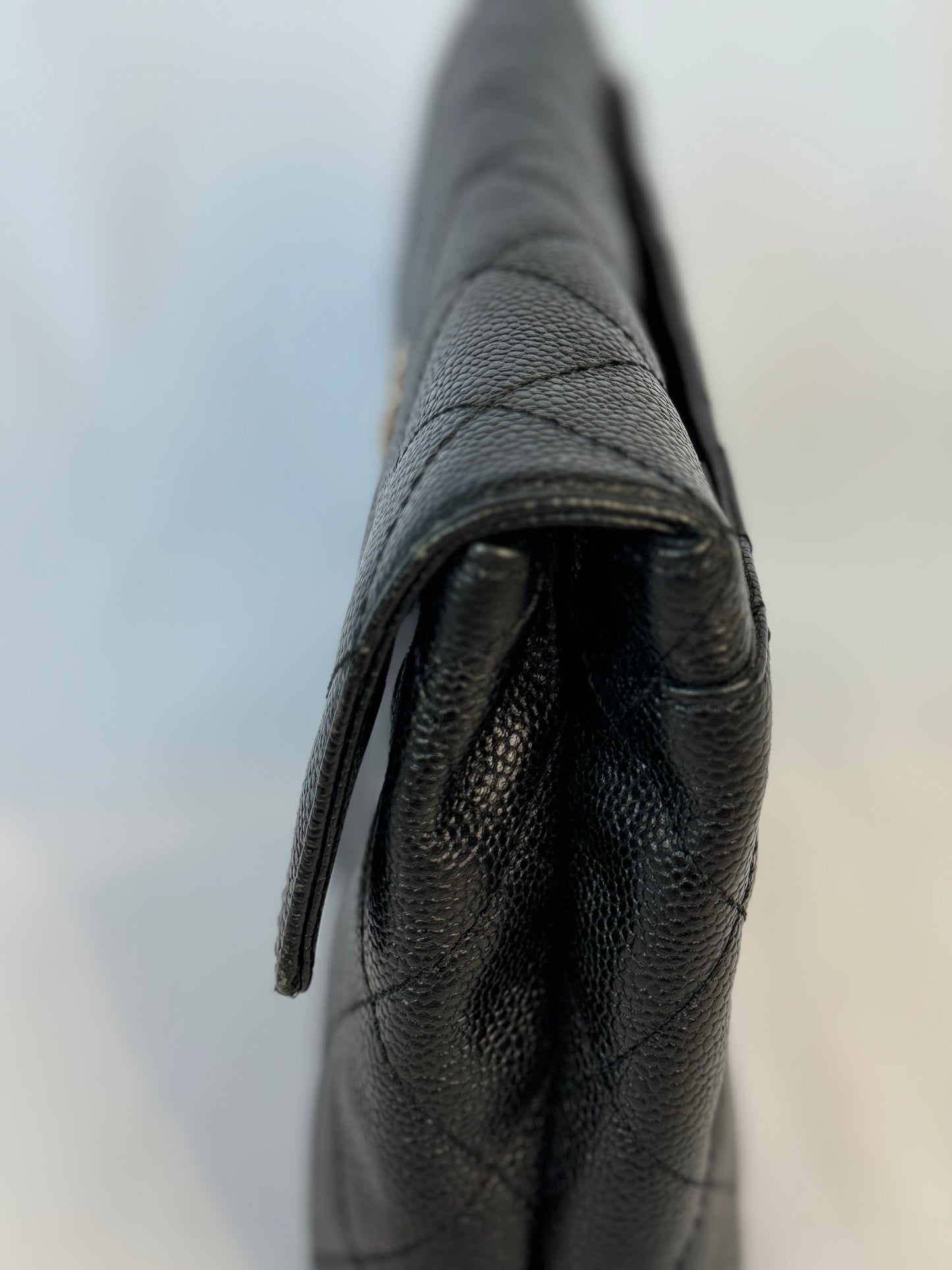 Chanel Quilted CC-flap clutch