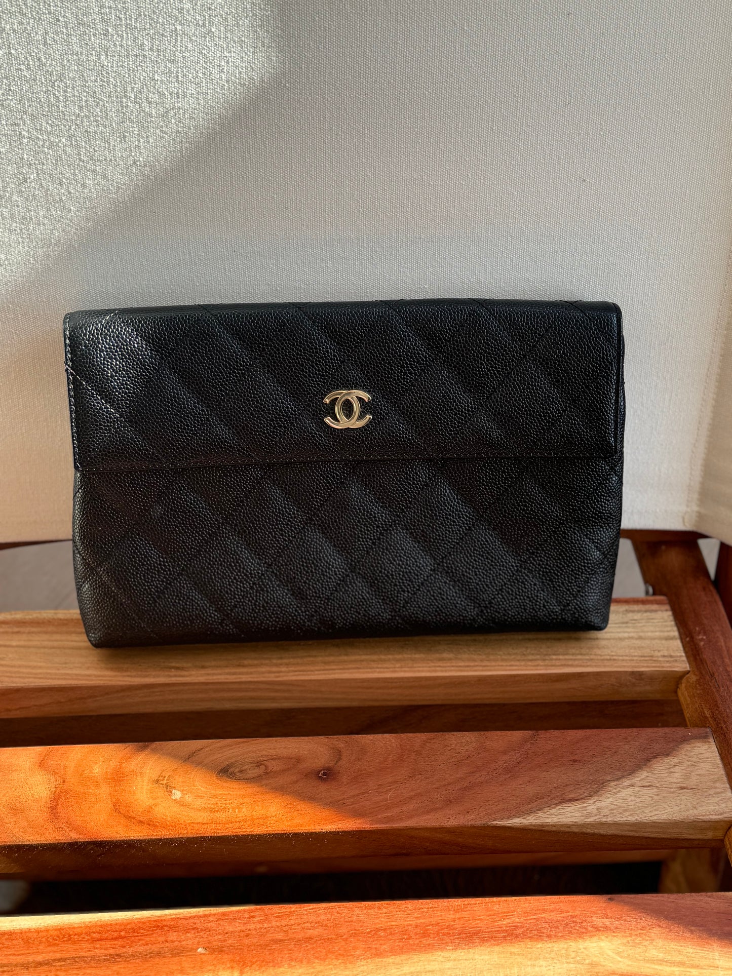 Chanel Quilted CC-flap clutch