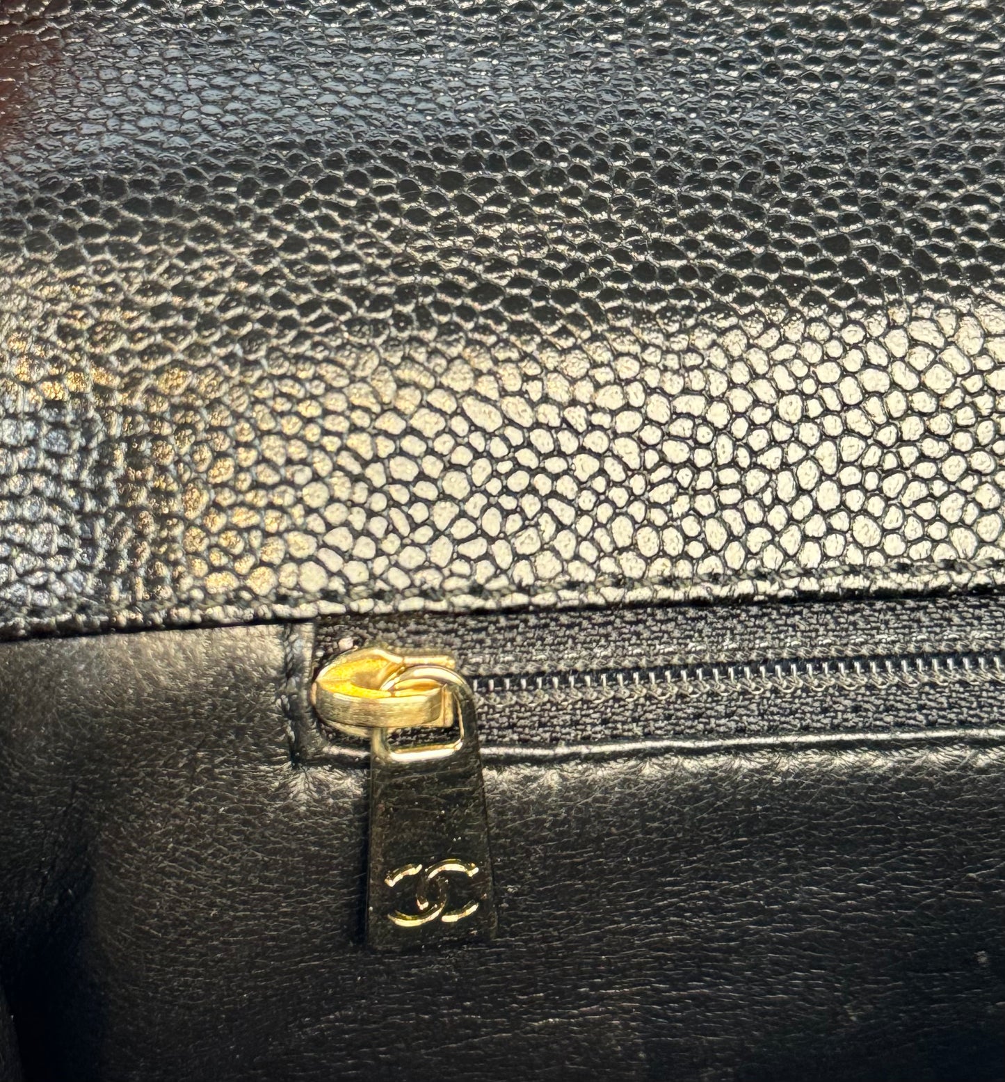 Chanel Quilted CC-flap clutch