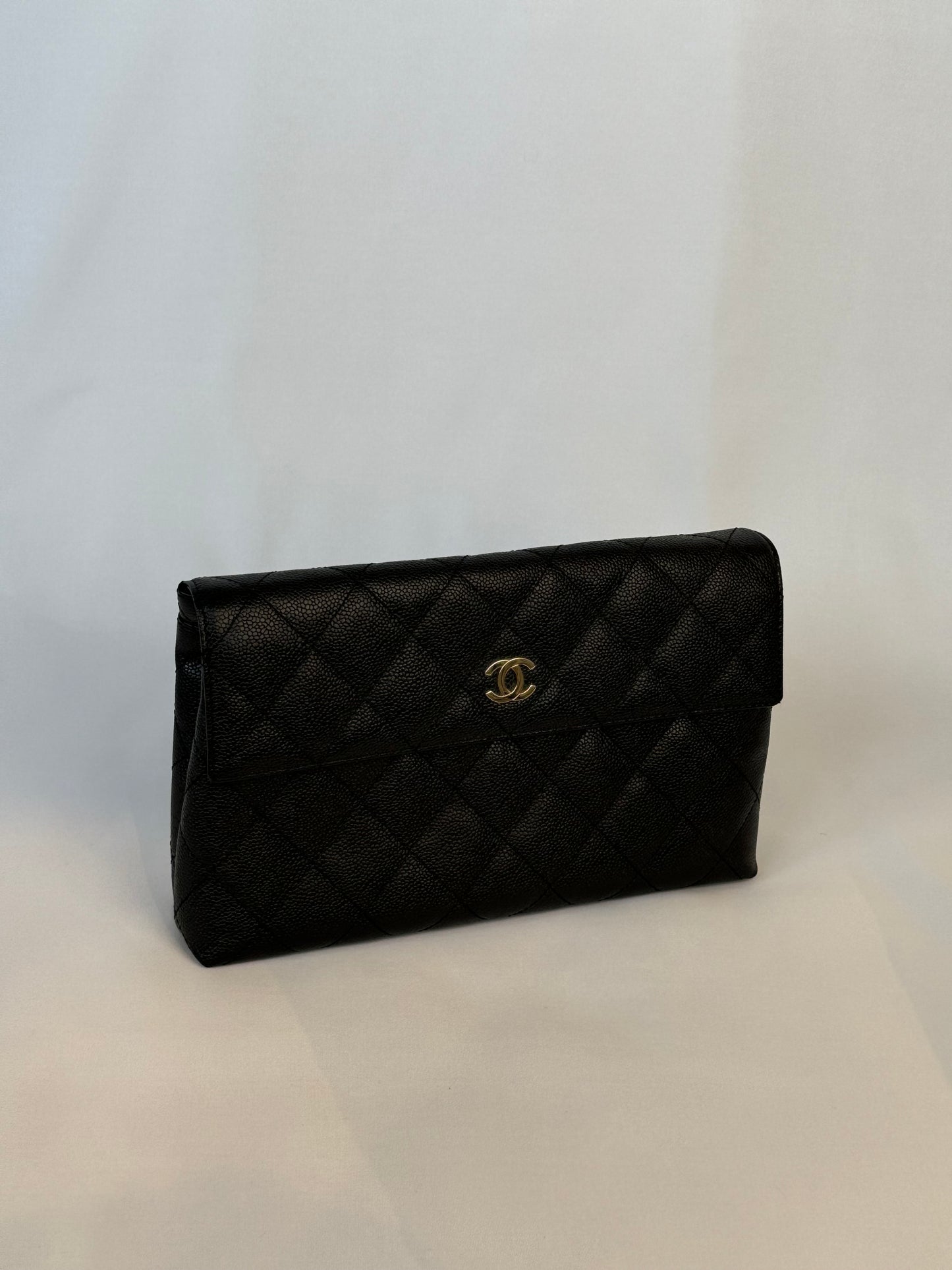 Chanel Quilted CC-flap clutch
