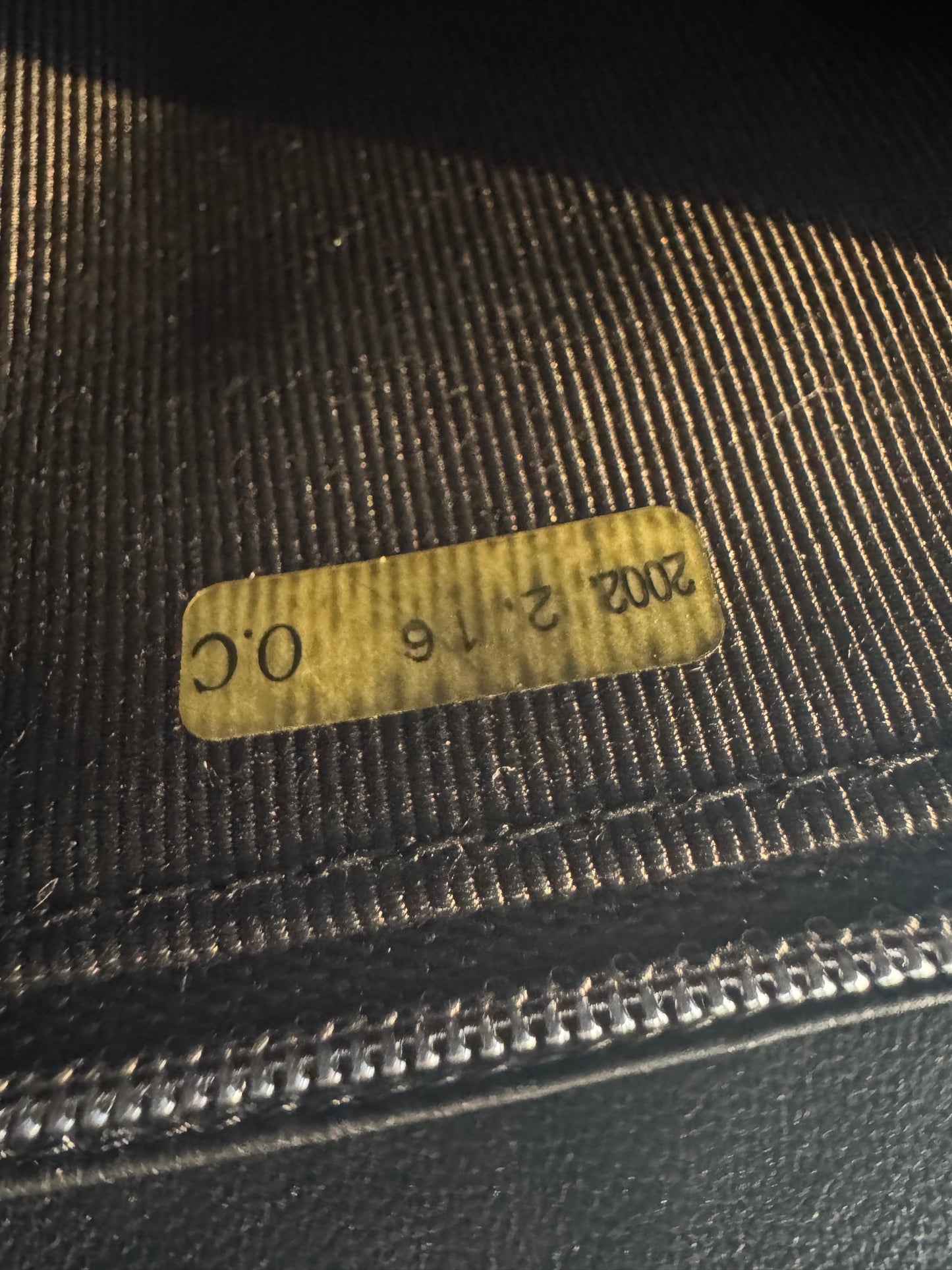 Chanel Quilted CC-flap clutch